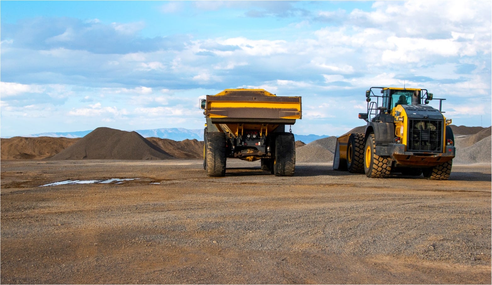 Loader and dozer at aggregate site | By Mary-Ann Zykin